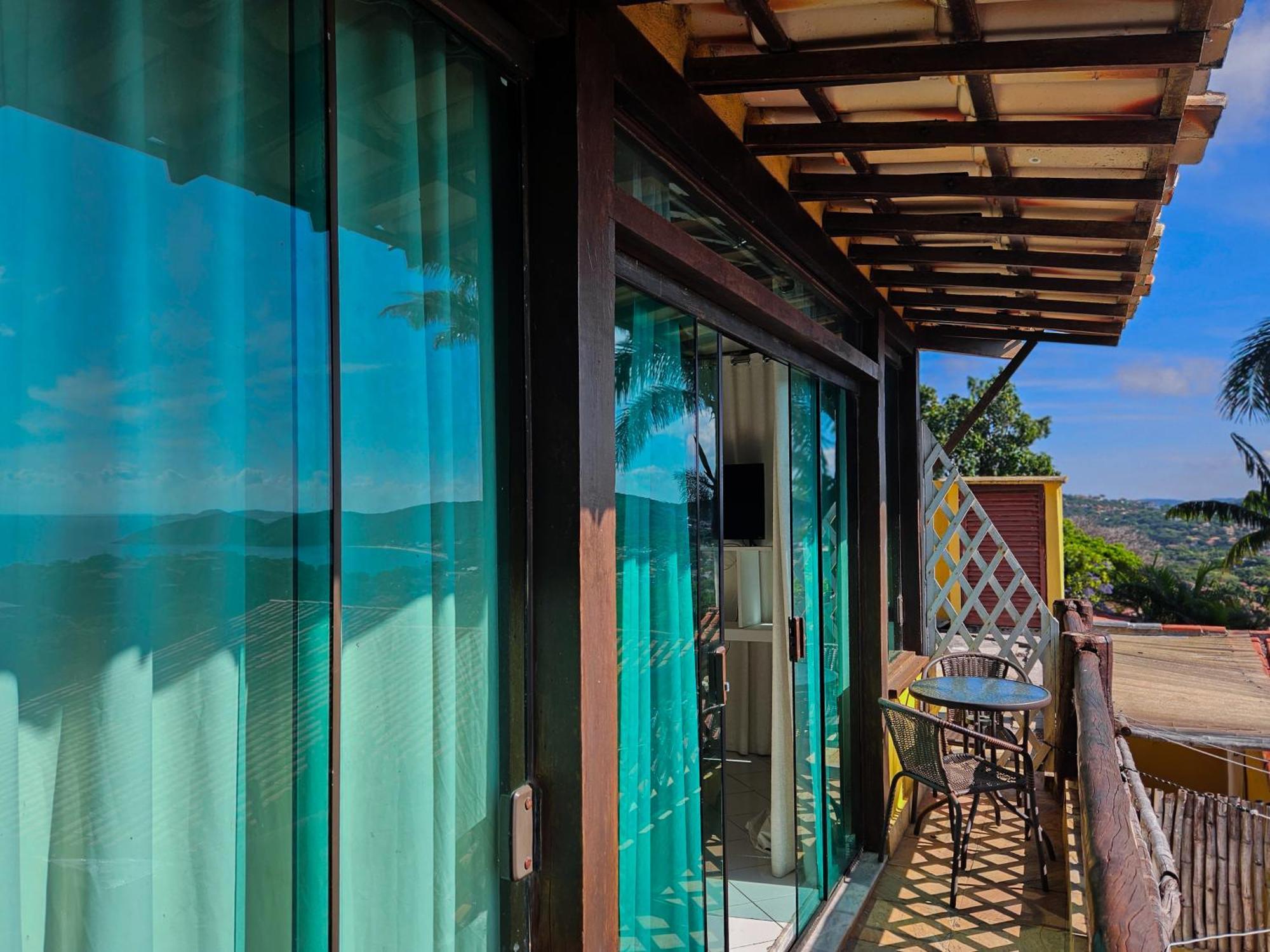 Готель Bella Vista Ocean View Армасан-душ-Бузіус Екстер'єр фото A glass house in the Philippines