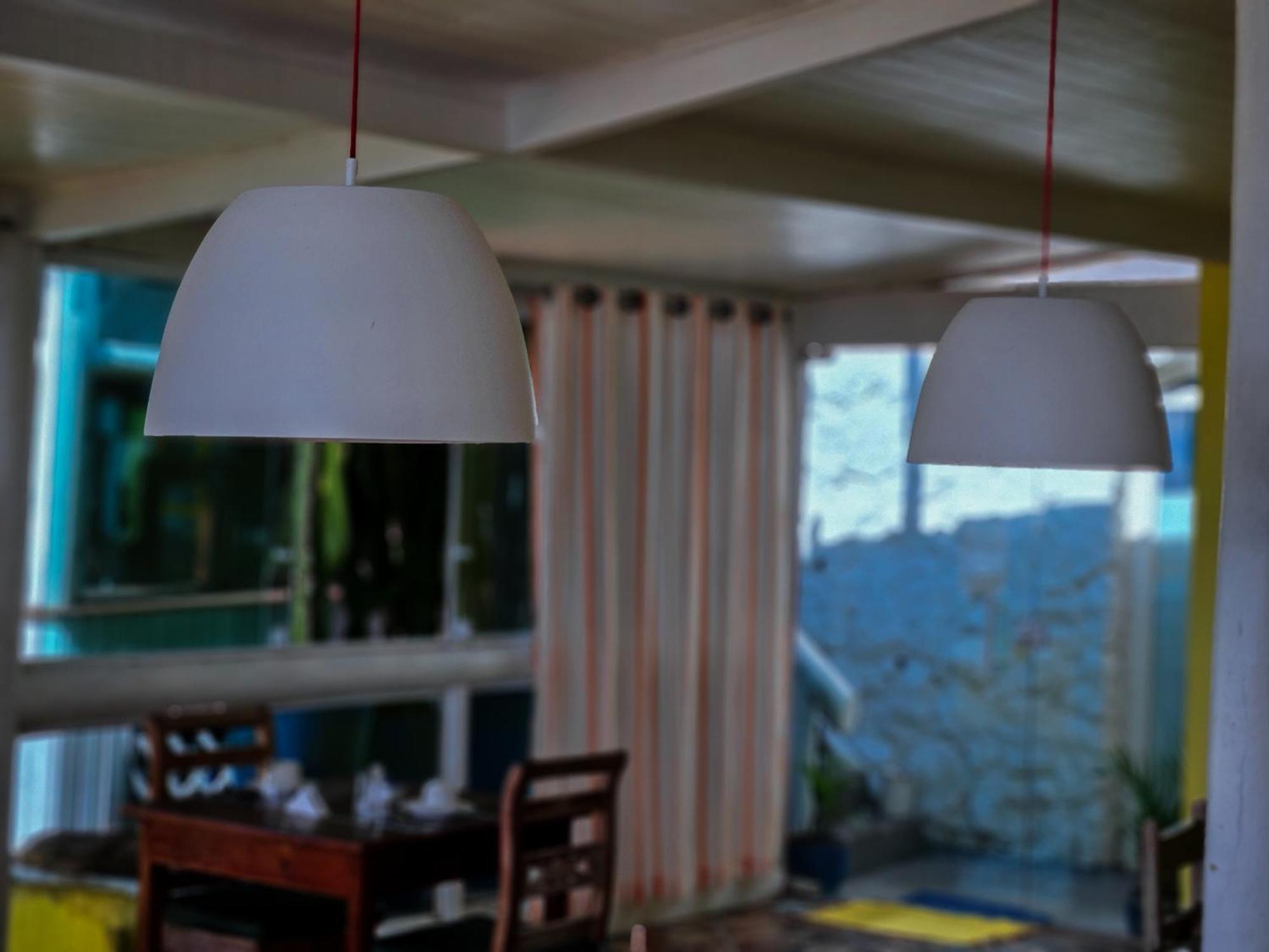 Готель Bella Vista Ocean View Армасан-душ-Бузіус Екстер'єр фото A pair of pendant lights